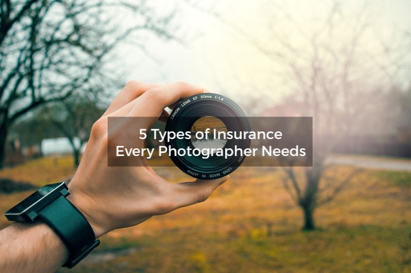 man holding camera lens