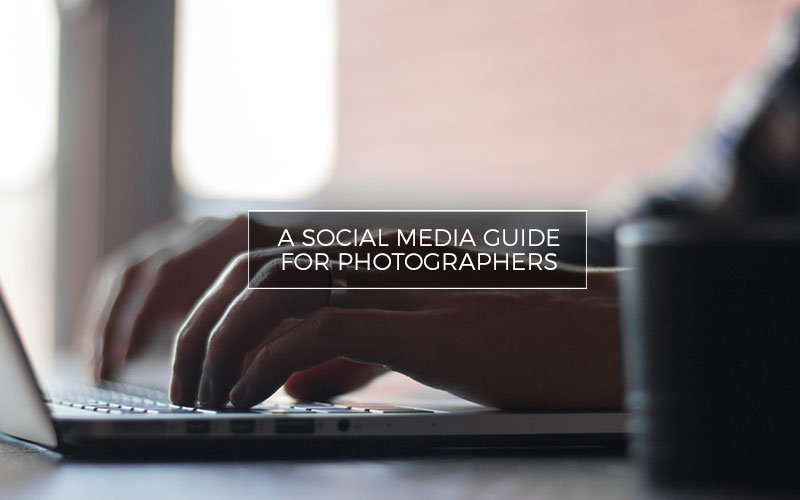 Portrait of a man typing on a laptop
