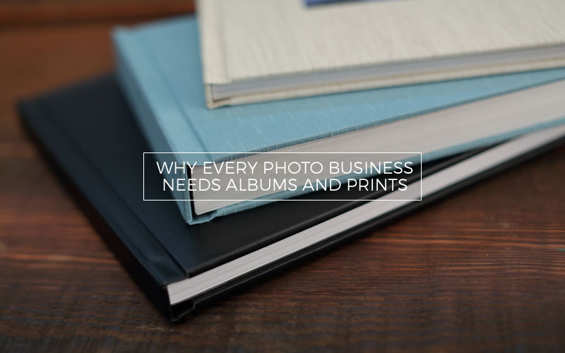 3 wedding photo albums on a coffee table