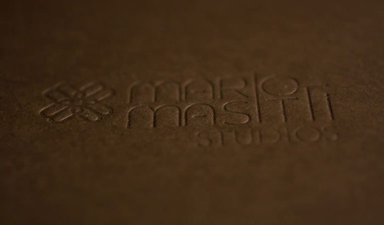 Logo-stamped folders for a photographer