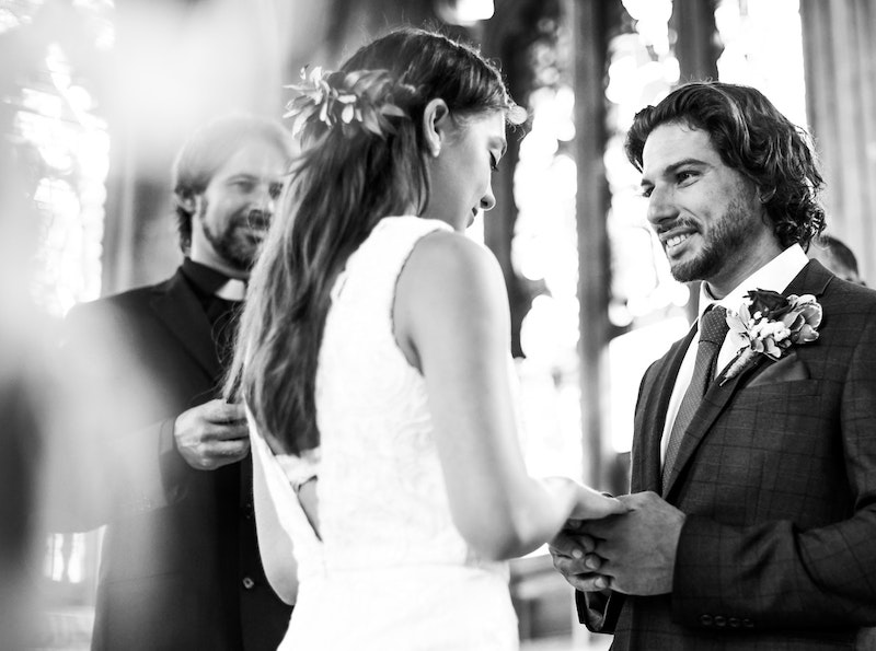 bride and groom at altar