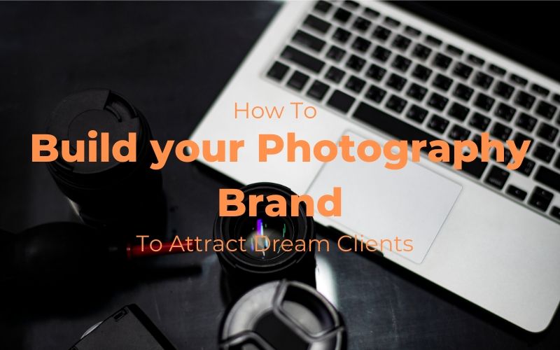 desk with camera and laptop