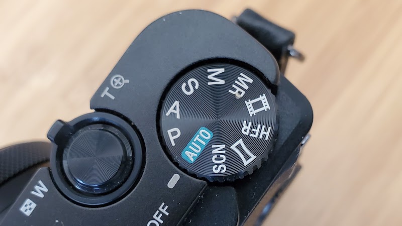 closeup of camera setting dial