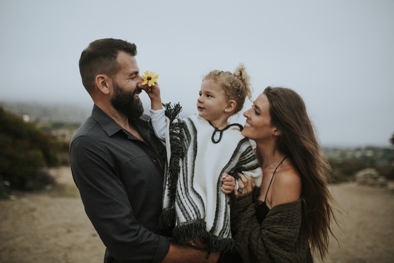 candid family portrait on a beach
