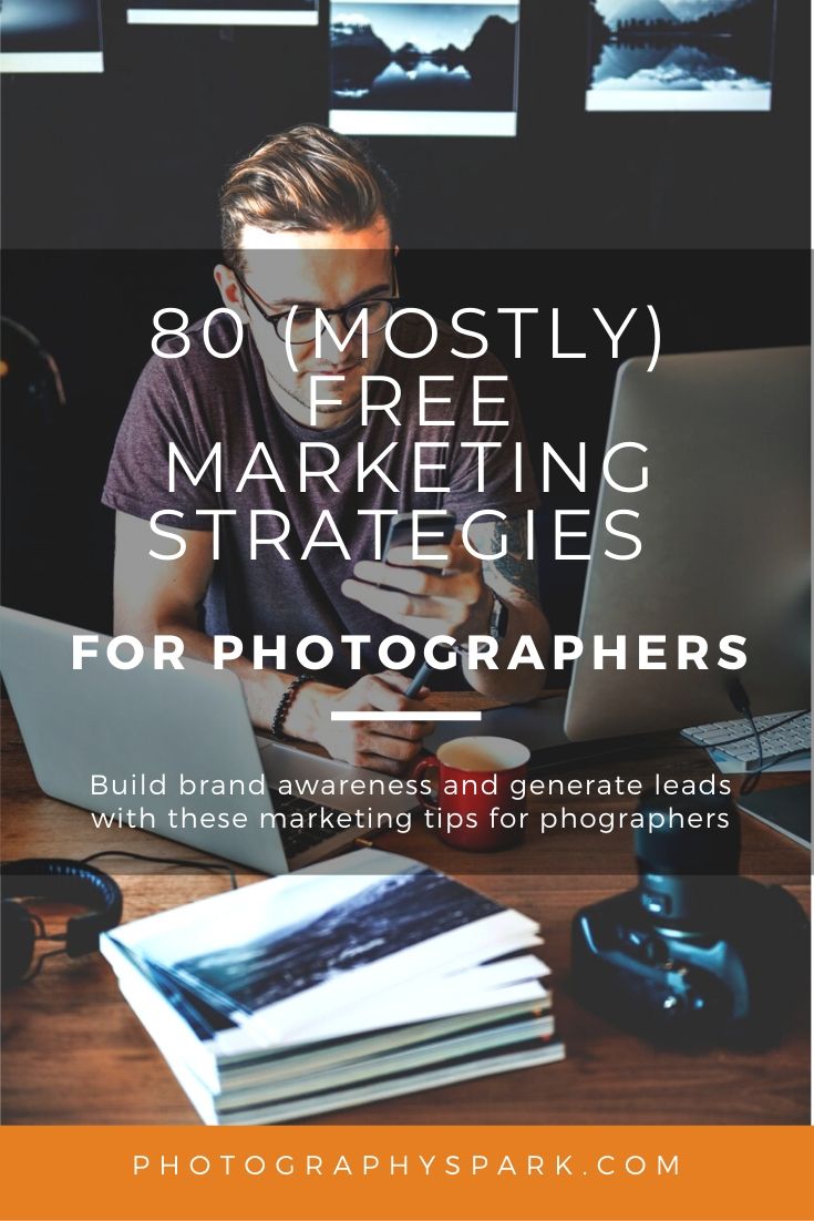 photographer at desk with laptop
