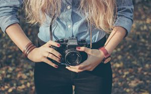 Woman holding a camera