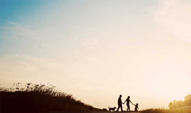 Silhouette of family walking