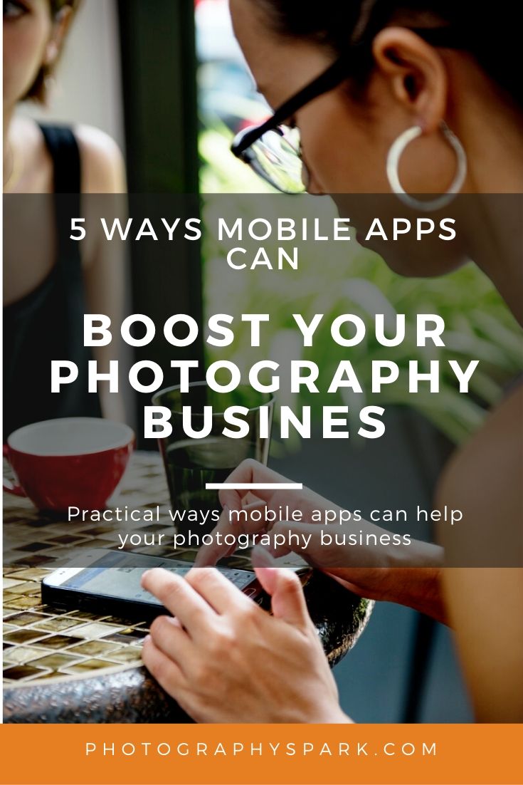 woman at coffee shop using mobile app on phone
