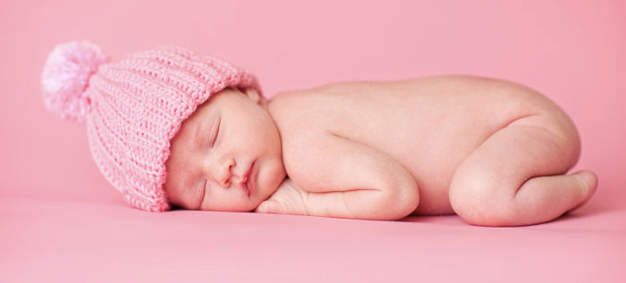 Newborn baby photo entered into a contest showing originality